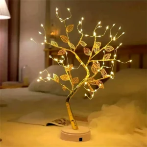 Petit arbre lumineux doré avec feuilles et branches LED diffusant une lumière chaude